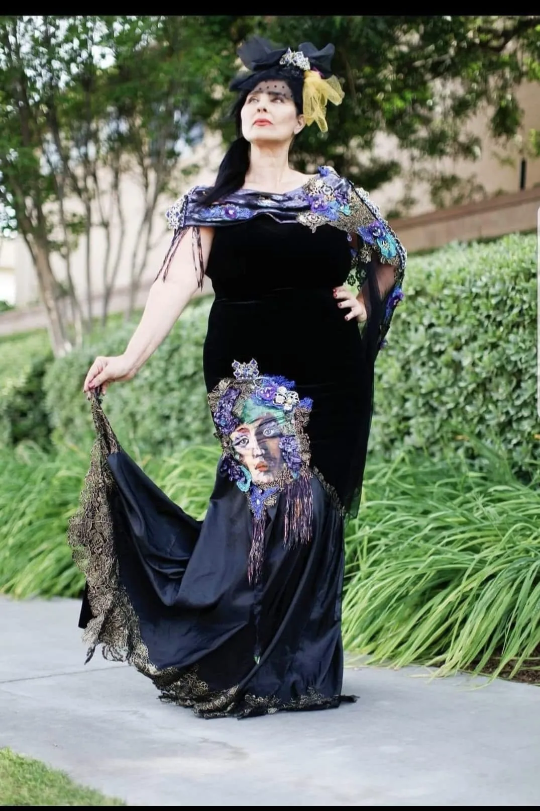 A finished black velvet gown, embroidered and painted by Mihaela